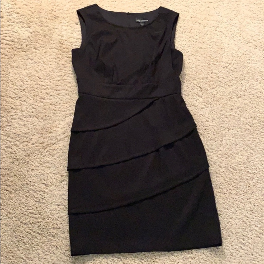 Perfect little black dress with subtle frill